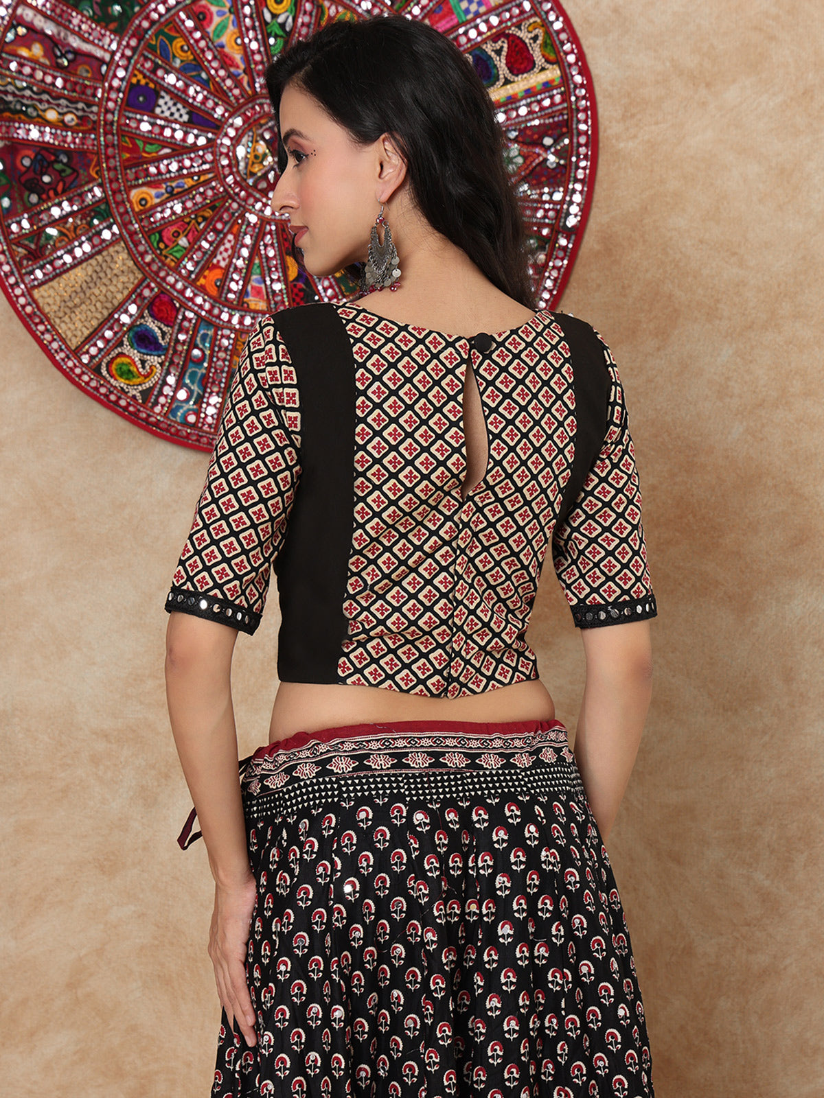 Black printed aabla work boat neck elbow sleeve blouse design