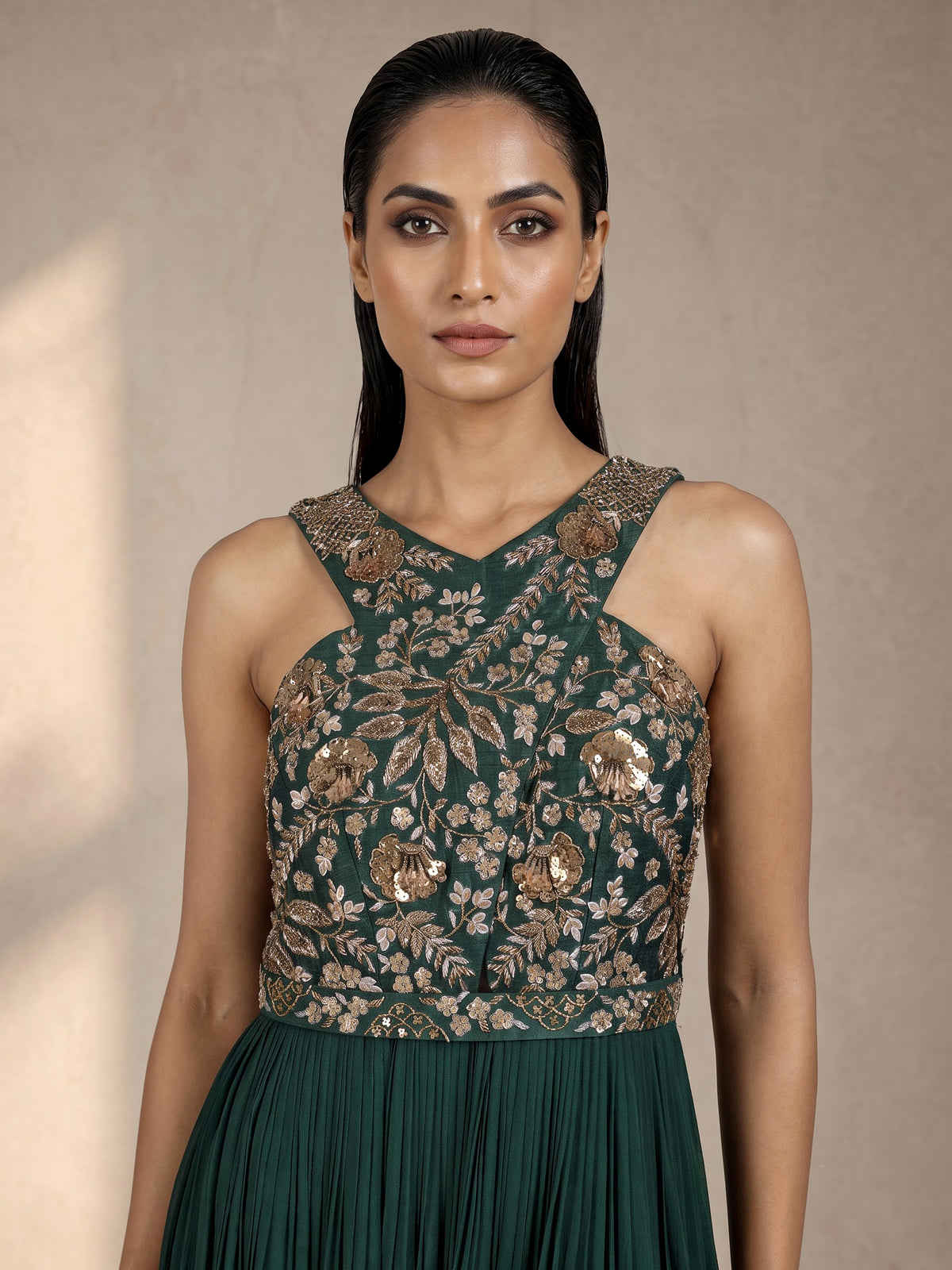 Bottle green georgette anarkali with waist belt and zardosi embellishments