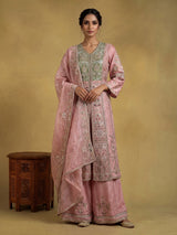 Light pink raw silk pakistani palazzo suit with heavy embellishments