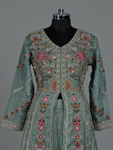 Pastel green silk pakistani anarkali lehenga with embellished dupatta