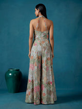 Pista green silk designer jumpsuit with floral resham embellishments