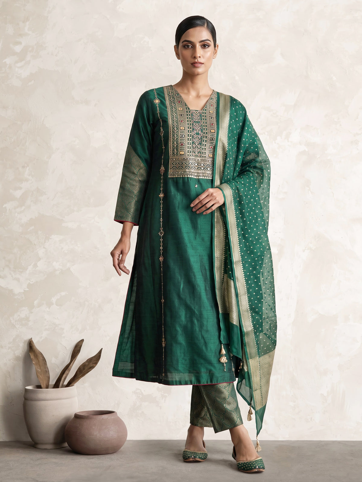 Green silk anarkali with cutdana, zardosi, stone diamond zari work