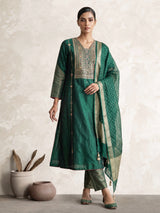 Green silk anarkali with cutdana, zardosi, stone diamond zari work