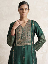 Green silk anarkali with cutdana, zardosi, stone diamond zari work