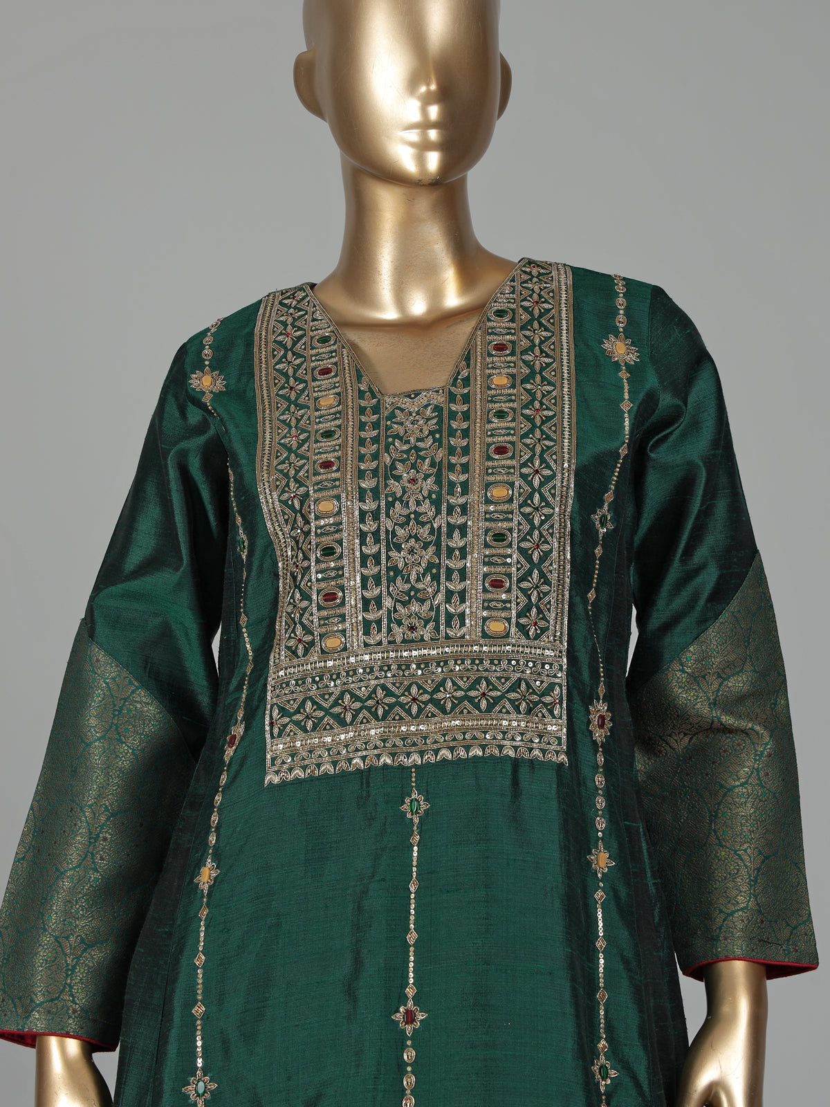 Green silk anarkali with cutdana, zardosi, stone diamond zari work