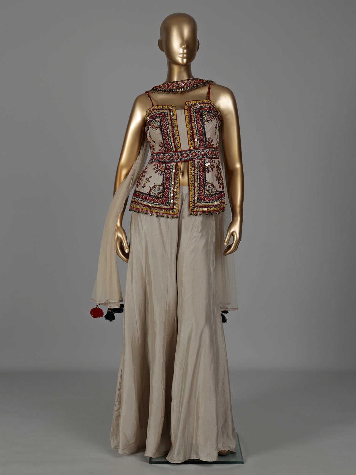 Beige silk designer palazzo suit with coin tassel detailing