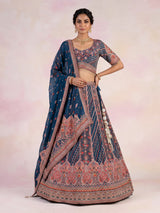 Rama blue silk lehenga choli with chevron panels and embellishments