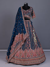 Rama blue silk lehenga choli with chevron panels and embellishments