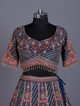 Rama blue silk lehenga choli with chevron panels and embellishments