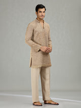Warm brown sculpted wave patterns men kurta suit