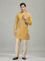 Yellow radiant wave ornamentation men kurta suit