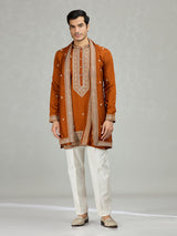Rust orange statement embroidered men kurta suit