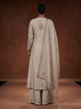 Off white tissue silk anarkali suit with pearl embellishments