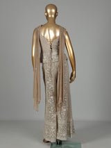 Beige georgette pakistani salwar suit with sparkling mirror embellishments