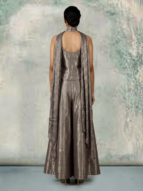 Pastel grey brocade silk salwar suit with zari embellishments