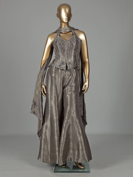 Pastel grey brocade silk salwar suit with zari embellishments