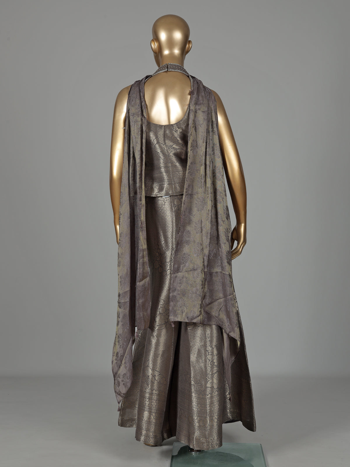 Pastel grey brocade silk salwar suit with zari embellishments
