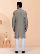 Pastel olive mens kurta suit with asymmetric floral zardosi detailing