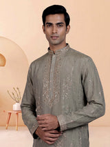Pastel olive mens kurta suit with asymmetric floral zardosi detailing