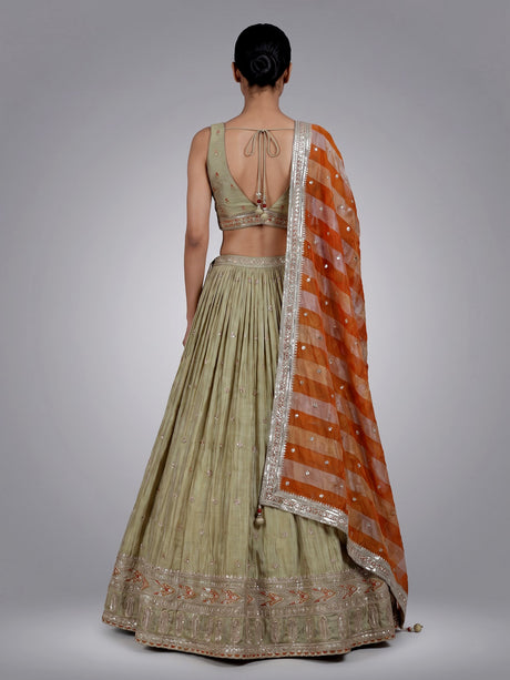 Pista green wedding wear lehenga choli in silk