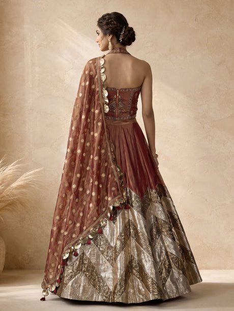 Rust red silk lehenga choli with intricate aabla embroidery