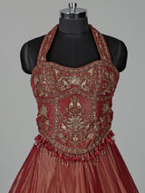 Rust red silk lehenga choli with intricate aabla embroidery