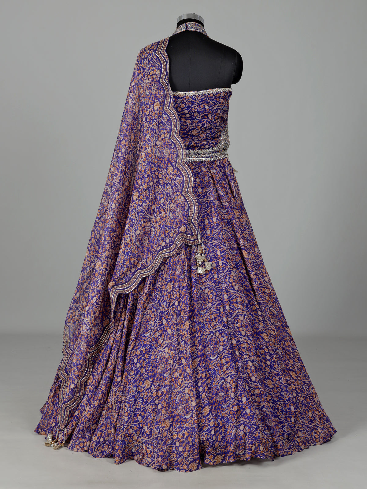 Blue georgette printed lehenga choli with embellished tassels