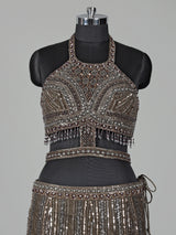 Dark mehendi green silk lehenga choli with diamond embellishments