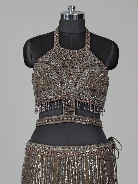 Dark mehendi green silk lehenga choli with diamond embellishments