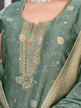 Green silk salwar suit with zardosi, aabla and diamond embellishments