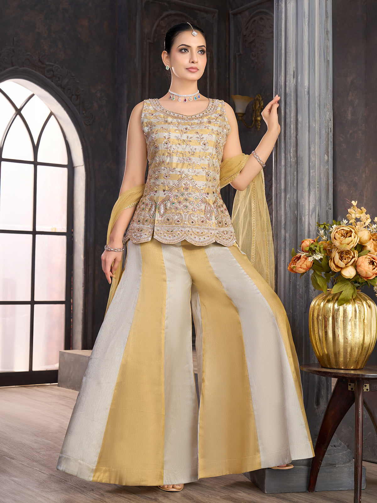 Golden grey silk palazzo suit with peacock motif embellishments