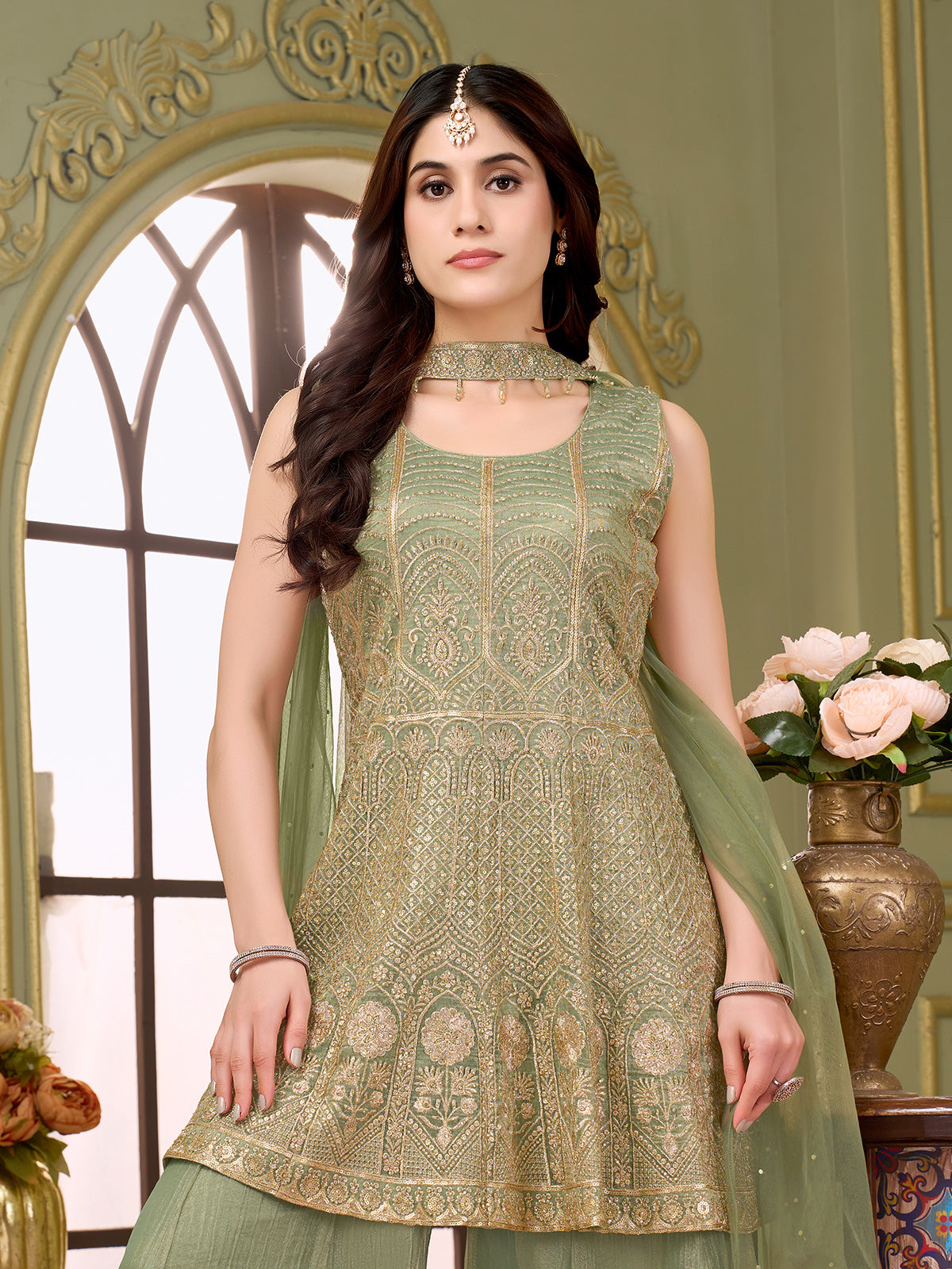 Pastel pista green chiffon silk palazzo suit with sequins work