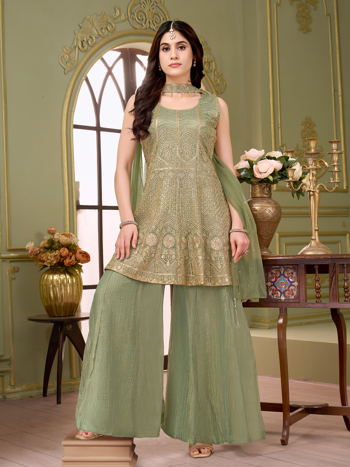 Pastel pista green chiffon silk palazzo suit with sequins work