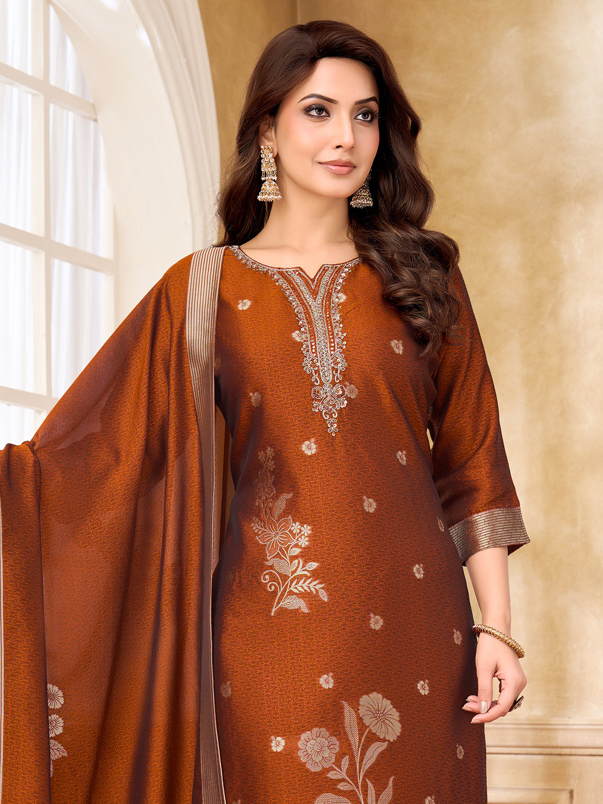Rust brown silk straight cut salwar suit with zardosi detailing