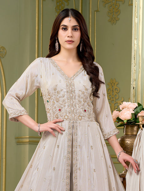 Cream silk anarkali salwar suit with embroidered butti work