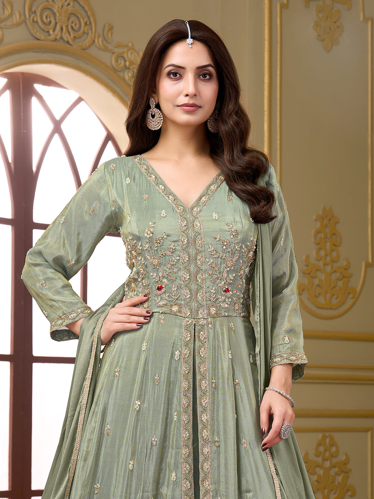 Pastel pista green silk anarkali palazzo suit with diamond embellishments