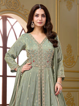 Pastel pista green silk anarkali palazzo suit with diamond embellishments