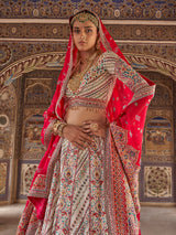 White patola inspired women bridal lehenga choli