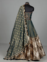 Pastel green silk lehenga choli with aabla and stone detailing