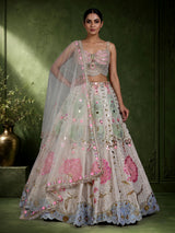 Beige silk lehenga choli with pearl and diamond embellishments