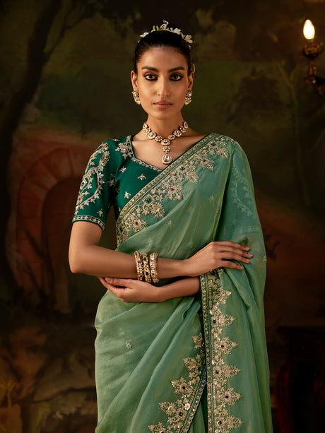 Green stone embellished tissue silk women saree