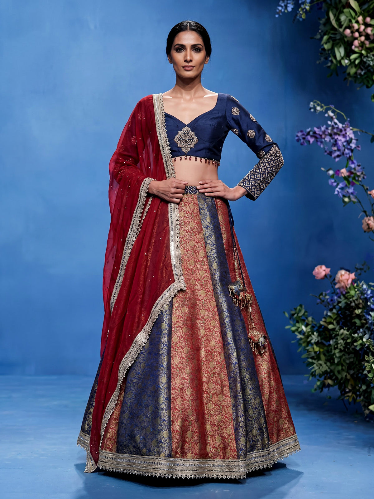 Navy blue brocade lehenga choli with mirror and zari embellishments