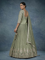 Pista green silk lehenga choli with sparkling zardosi embellishments
