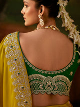 Mustard yellow embroidered tissue silk women saree