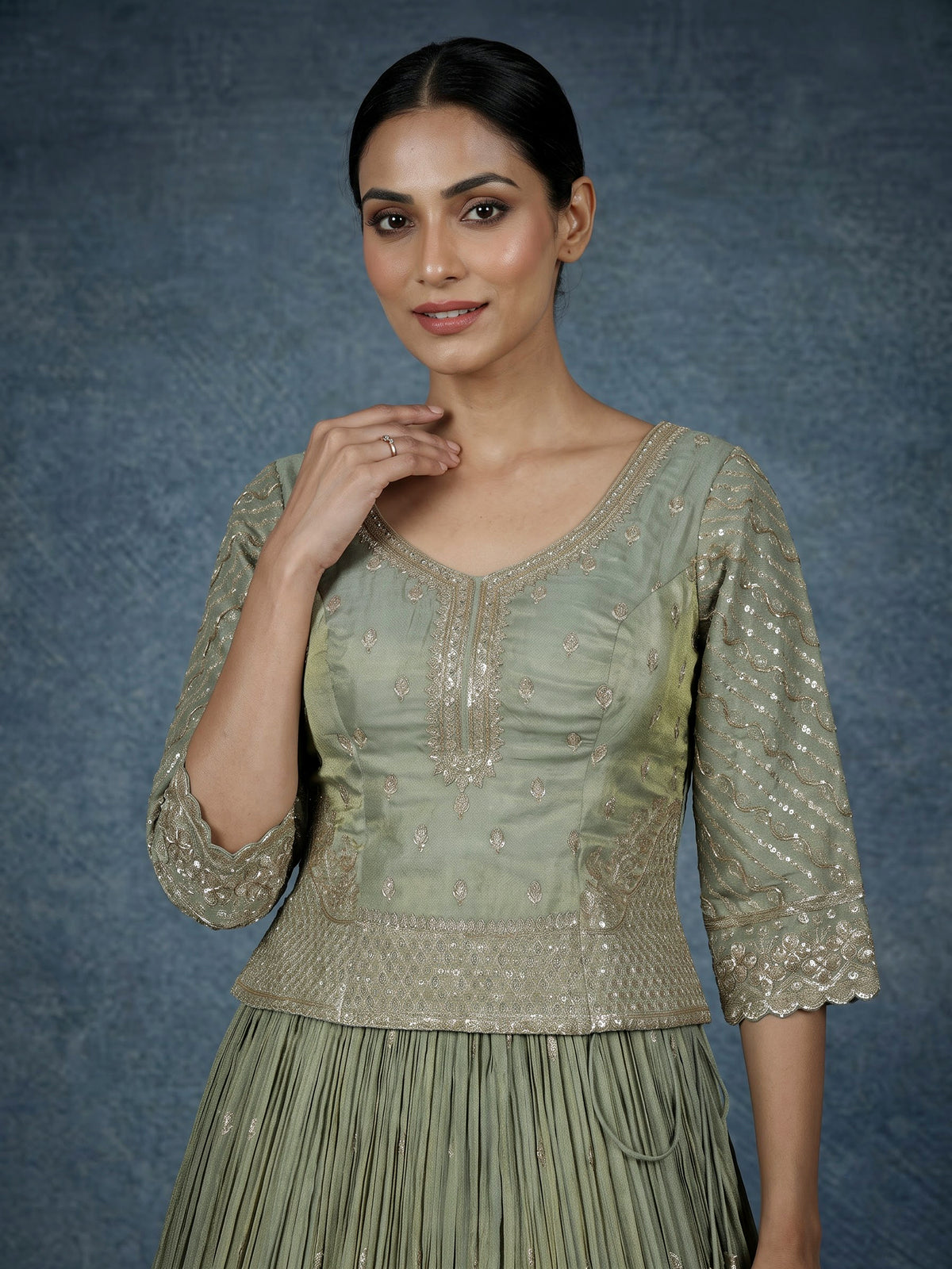 Pista green silk lehenga choli with sparkling zardosi embellishments