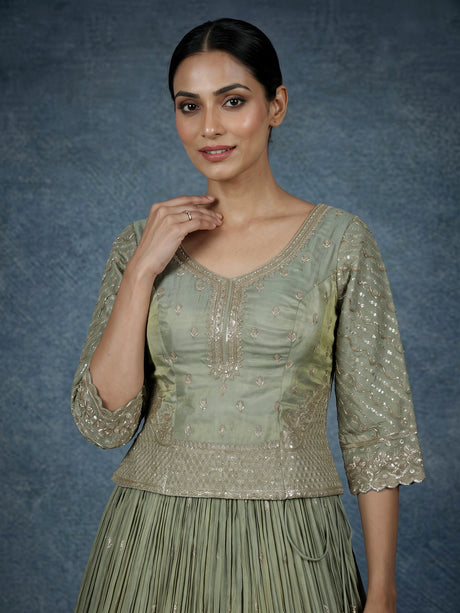 Pista green silk lehenga choli with sparkling zardosi embellishments