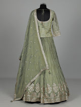 Pista green silk lehenga choli with sparkling zardosi embellishments