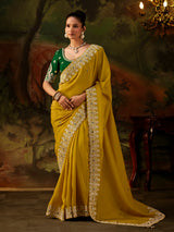 Mustard yellow embroidered tissue silk women saree