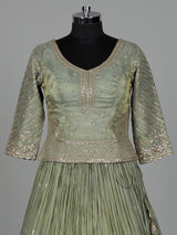 Pista green silk lehenga choli with sparkling zardosi embellishments