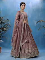 Pastel purple silk lehenga choli with intricate zardosi work